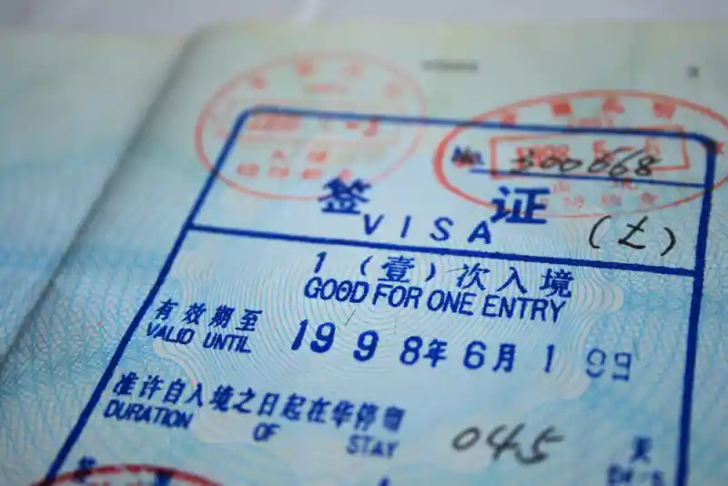 How can I apply for a transit visa if I plan to leave the airport during my layover?